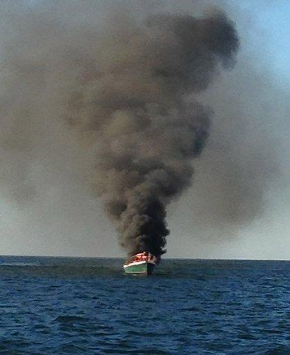 September 2014-Fully involved boat on fire off of Watch Hill Lighthouse.