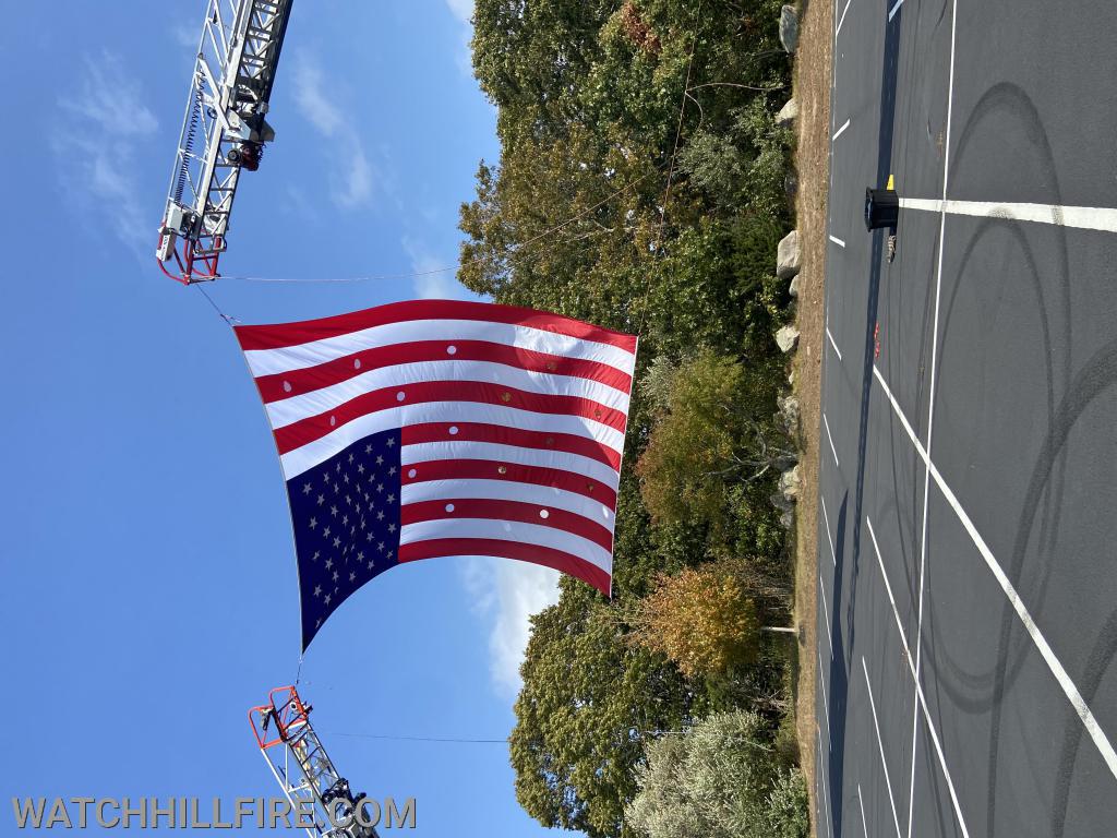 Firefighters from Westerly and Watch Hill practiced setting up and displaying the new flag when it arrived. 