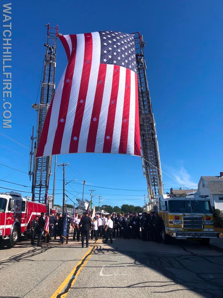 Watch Hill Ladder 104 and Westerly Ladder  1 Display the American Flag at the Beginning of the Procession
