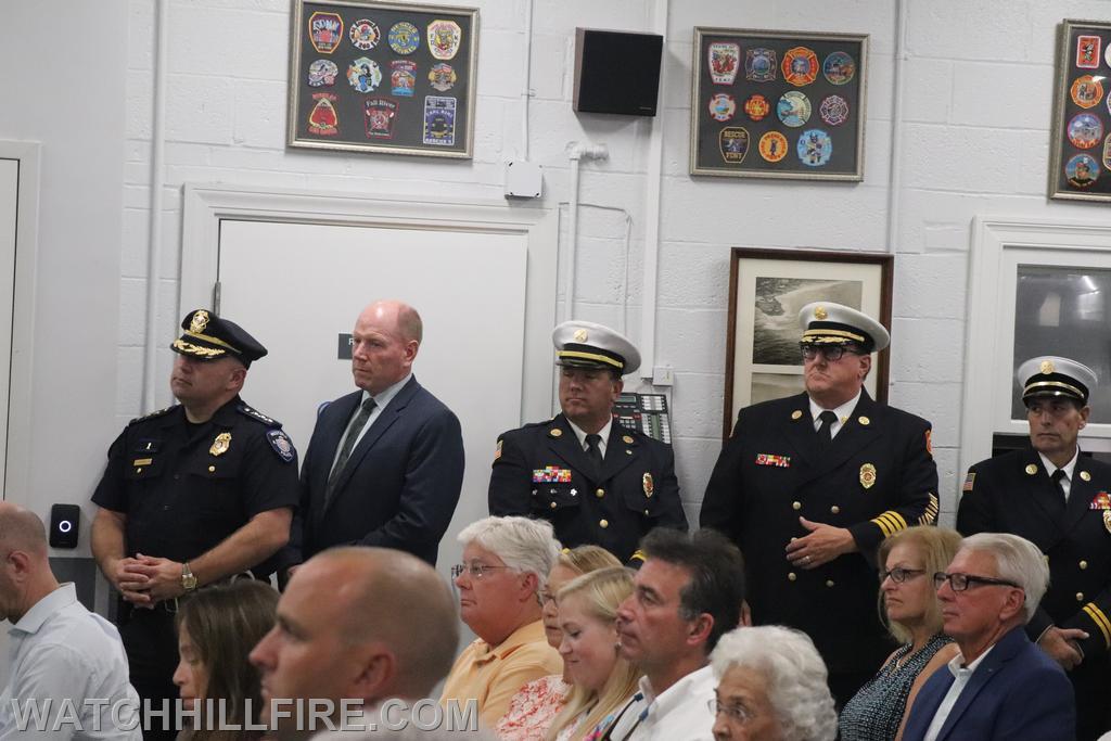 Westerly Police Chief Paul Gingerella and Town Manager Shawn Lacey join members of the North Providence Fire Department