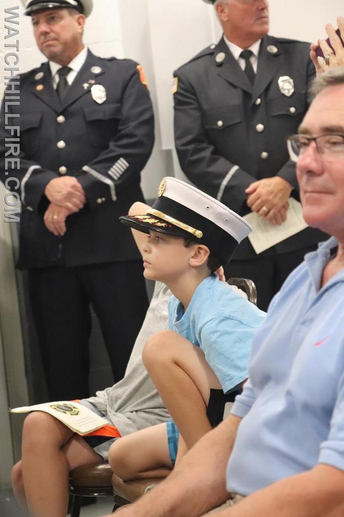 Camden Simmons wears his Dad's Chief's hat during the event. His Dad, Jason served as Chief from 2010-2013