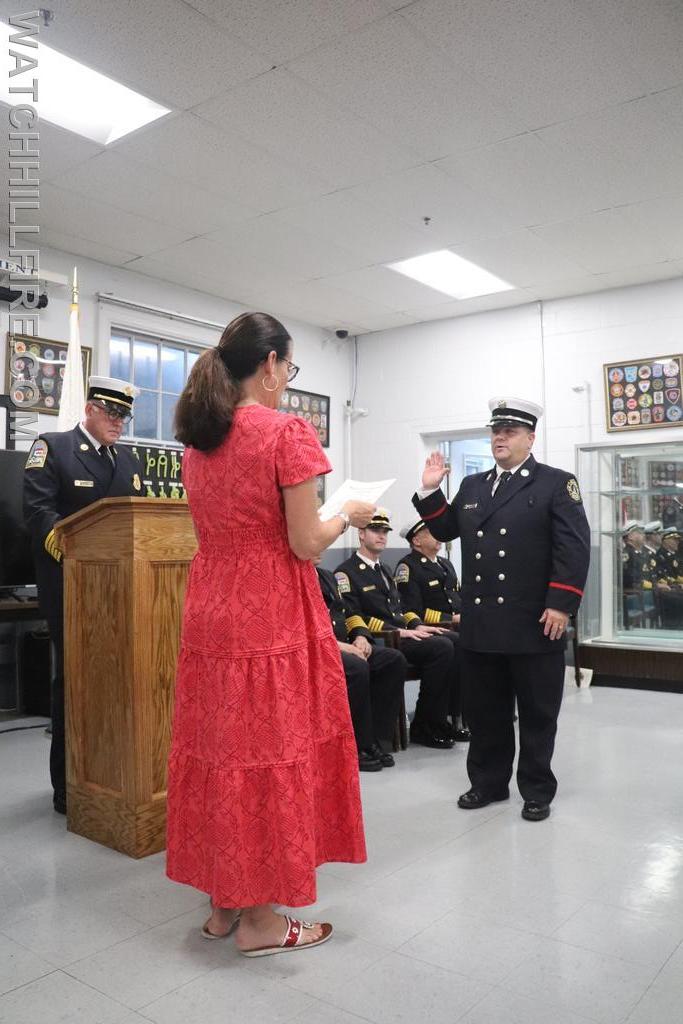 WHFD Deputy Moderator Barbara Knowlton offers the Oath of Office to Fire Marshal Chris Moore